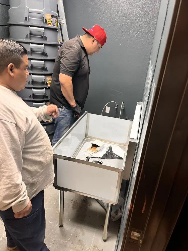 Commercial plumbing and sink installation in Kearns
